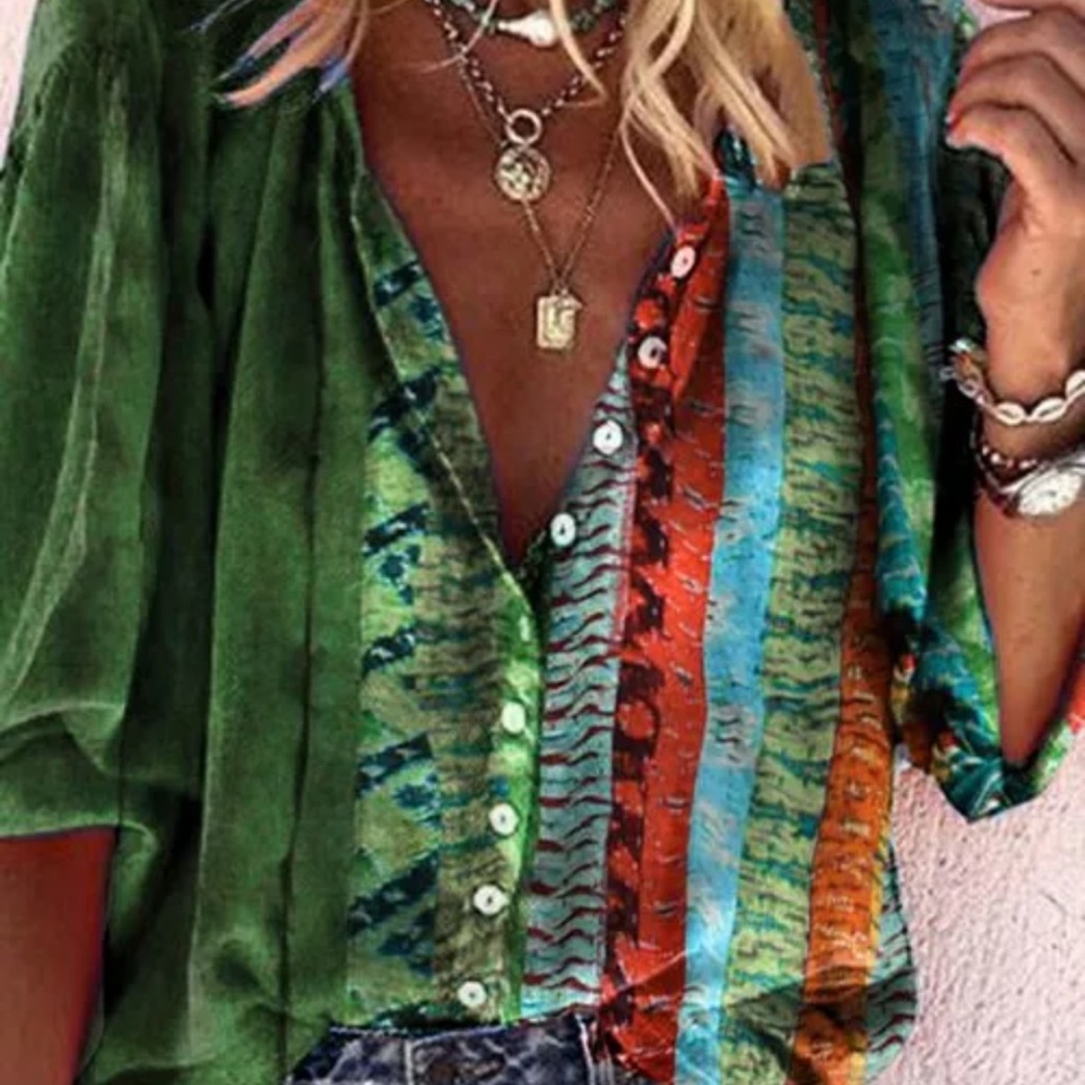 Cute blouse!  Never worn w/tags.